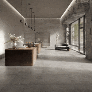 Ambiente commerciale moderno con pavimento e rivestimento Tex-Grey effetto cemento grigio, illuminazione a soffitto e arredi minimalisti in legno